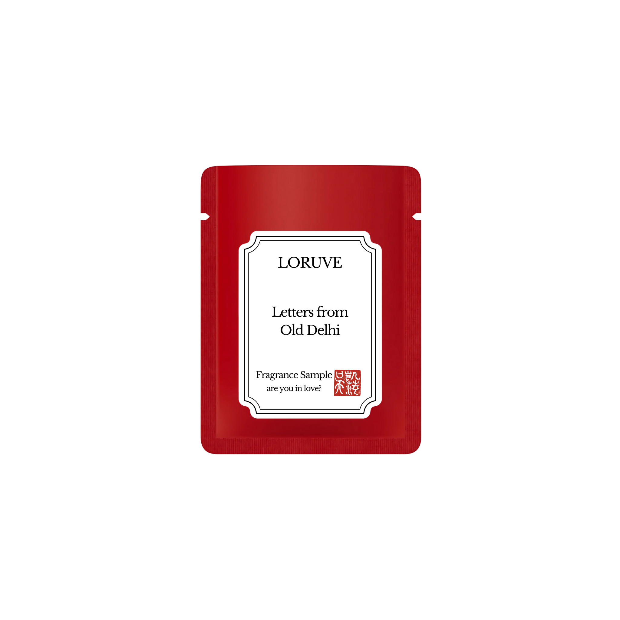 Red Loruve fragrance sample packet on a white background