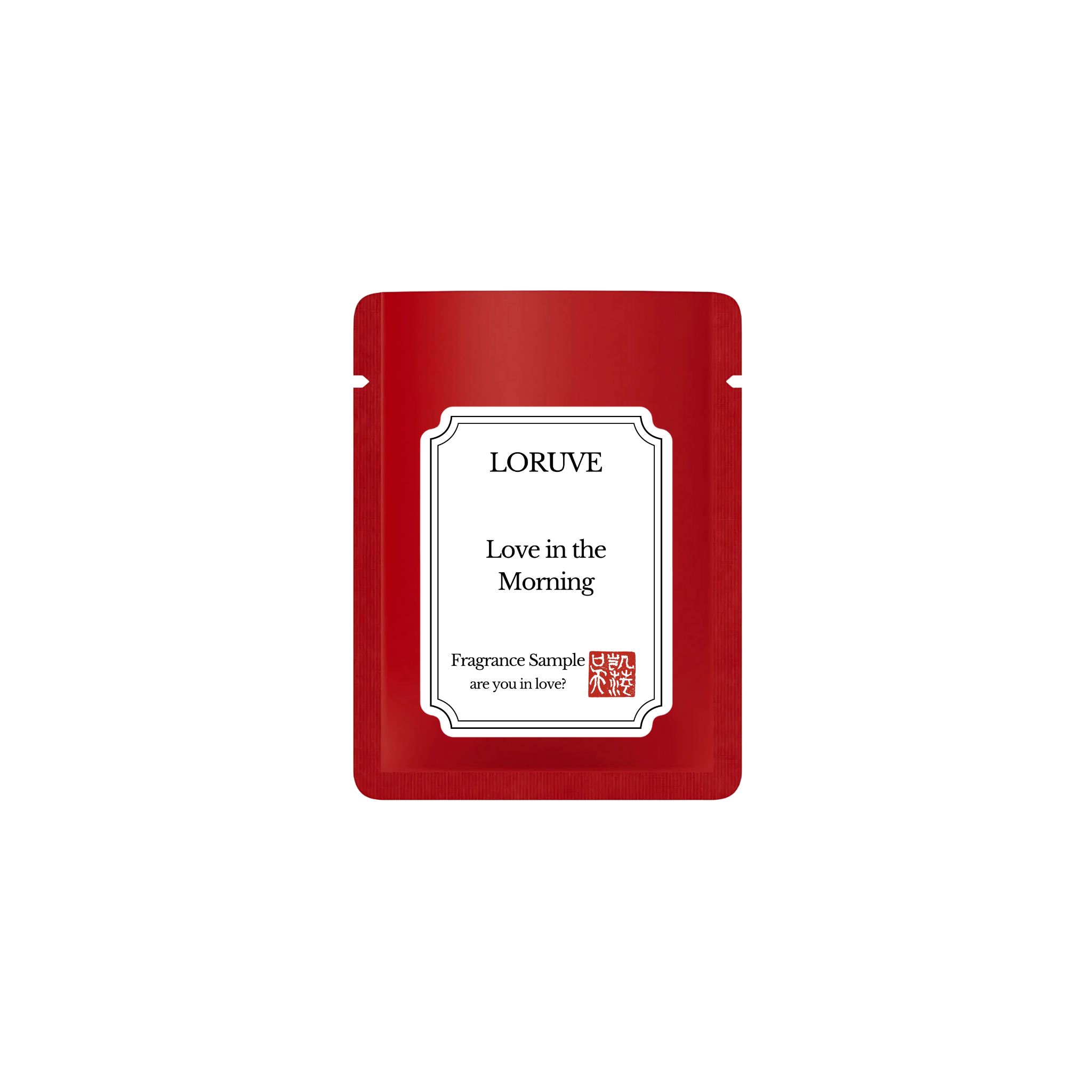 Red fragrance sample pouch with 'LORUVE' branding on a white background